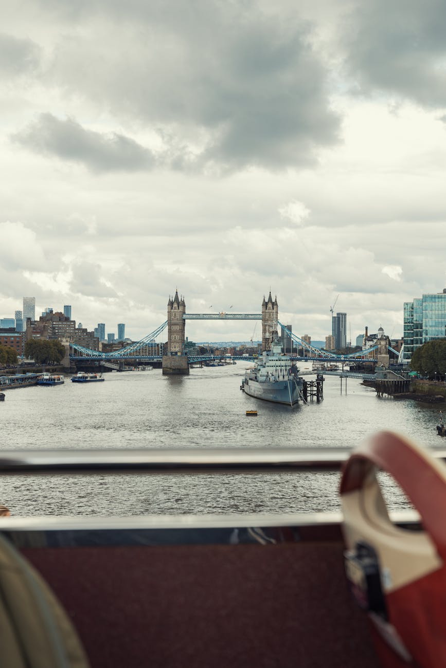 A scenic view of London’s Tower Bridge featuring the River Thames and iconic skyline.