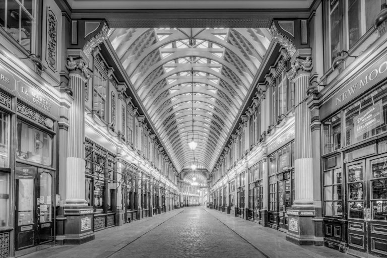 A classic monochrome view of the historic Leadenhall Market's stunning architecture in London, UK.