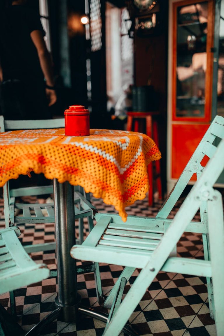 A charming vintage cafe scene with colorful furniture and retro design elements.