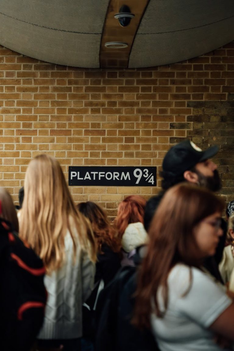 Visitors gather at Platform 9¾, a popular Harry Potter attraction in King's Cross, London.